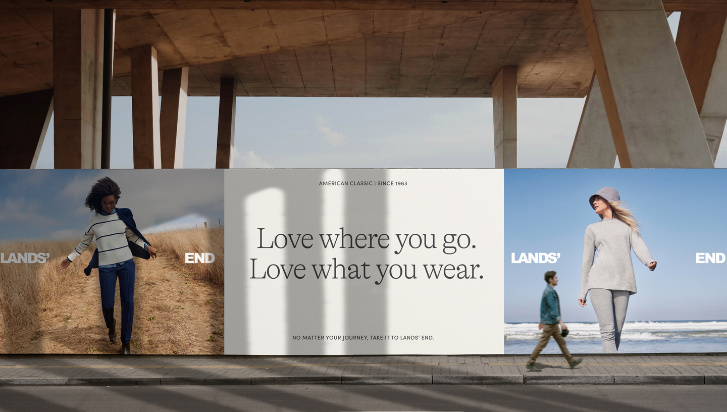 An outdoor billboard featuring Lands' End brand identity with the tagline "Love where you go. Love what you wear."