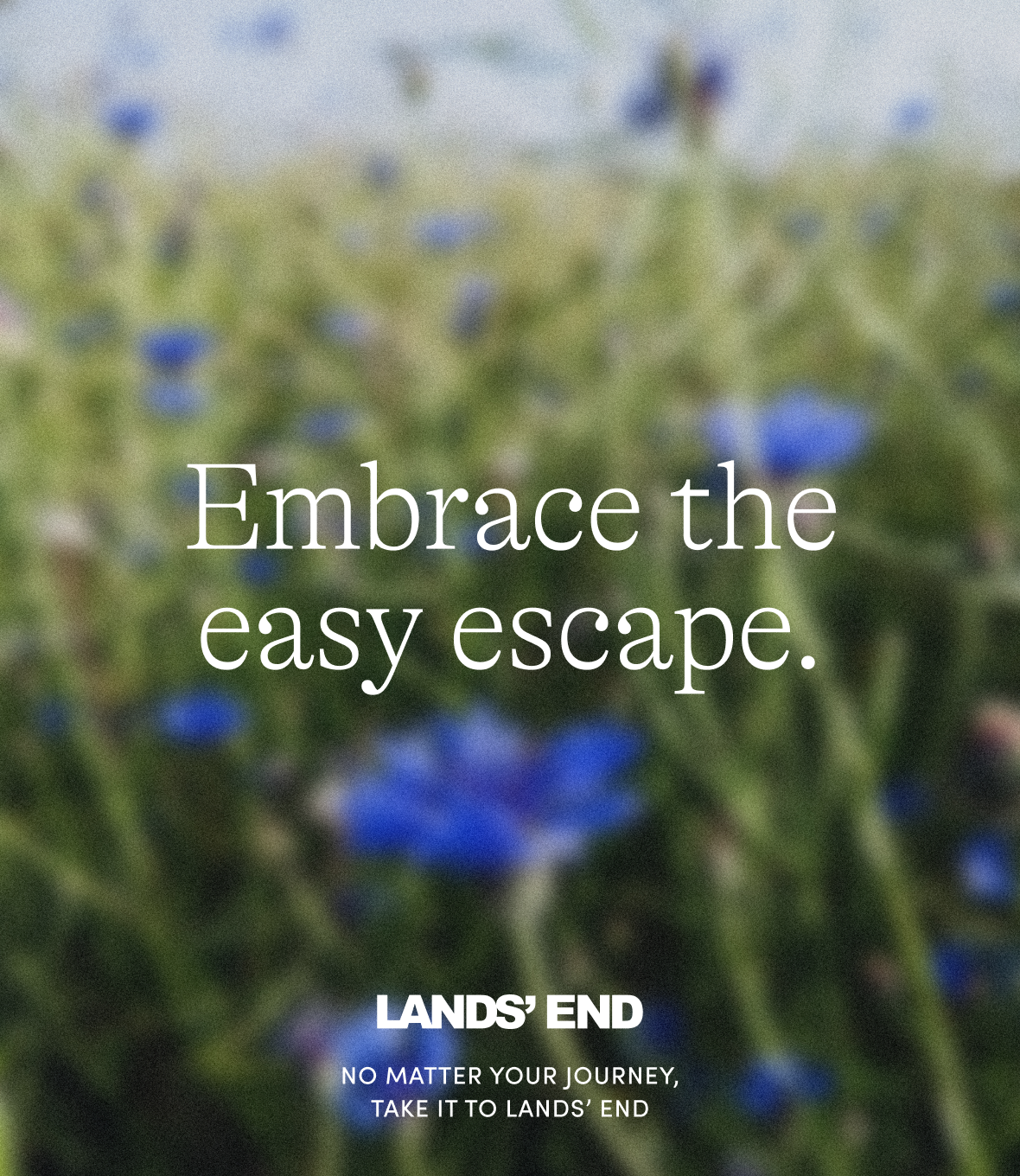 Graphic for Lands' End featuring a blurred meadow background with blue wildflowers. The text reads, "Embrace the easy escape." Below, the Lands' End logo is displayed, accompanied by the tagline, "No matter your journey, take it to Lands' End."