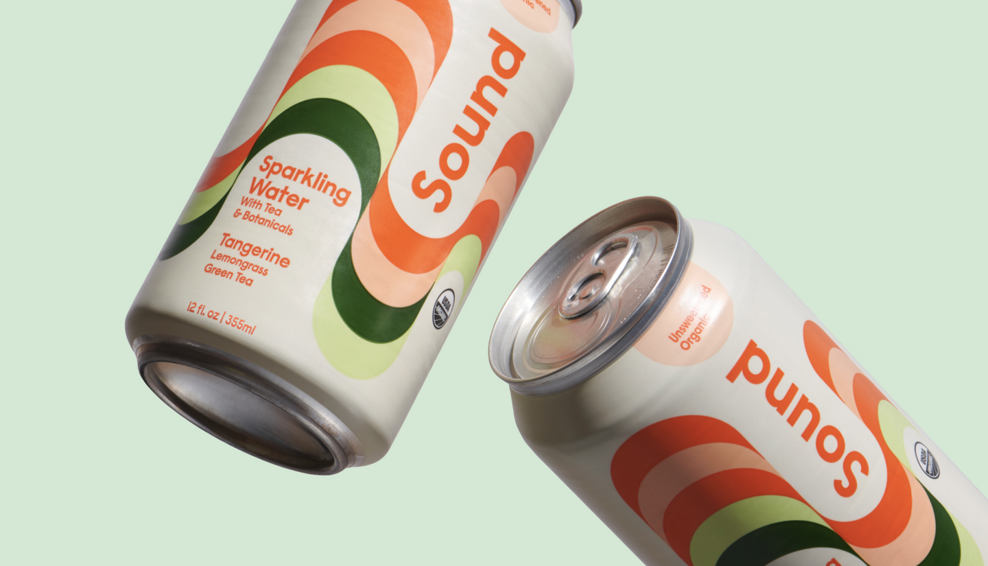 Two Sound sparkling water cans floating against a light green background. The cans feature a modern, wavy design in orange, green, and peach colors, with the label highlighting the Tangerine Lemongrass Green Tea flavor and organic unsweetened ingredients.