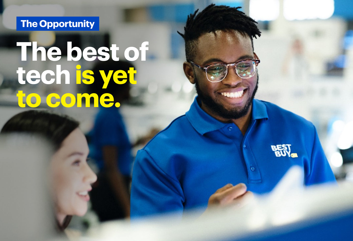 A smiling Best Buy employee in a blue uniform assists a customer in a store. Text overlay reads: 'The Opportunity. The best of tech is yet to come.'